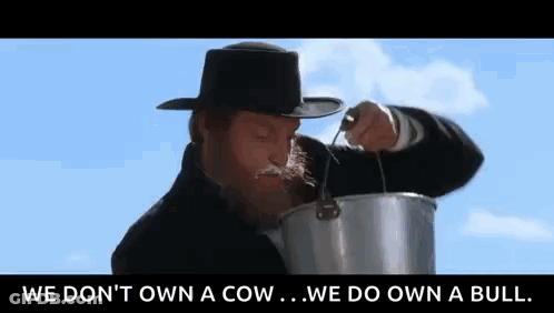 Man With Beard Holding Milk Bucket GIF
