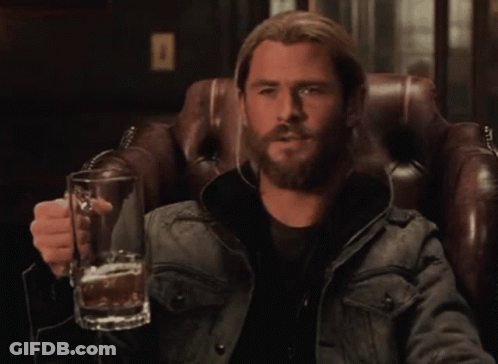 Man With Beard Holding Mug Of Beer GIF