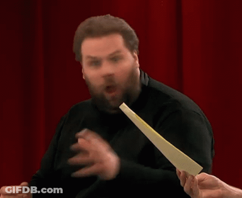 Man With Beard Holding Paper GIF