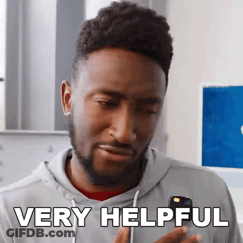 Man With Beard Holding Phone Saying Very Helpful GIF