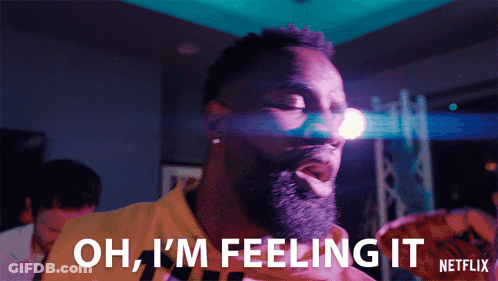 Man With Beard Holding Pizza Says Oh I'm Feeling It GIF