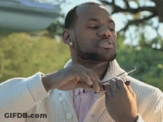 Man With Beard Holding Scissors GIF
