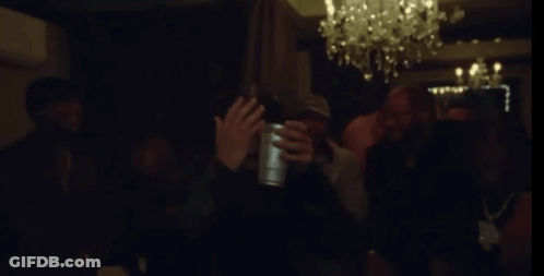 Man With Beard Holding Silver Cup GIF