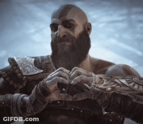 Man With Beard Holding Something GIF