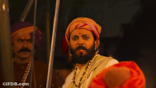 Man With Beard Holding Sword GIF