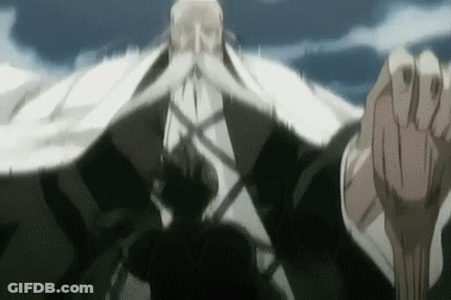 Man With Beard Holding Sword In Front Of Mountain GIF