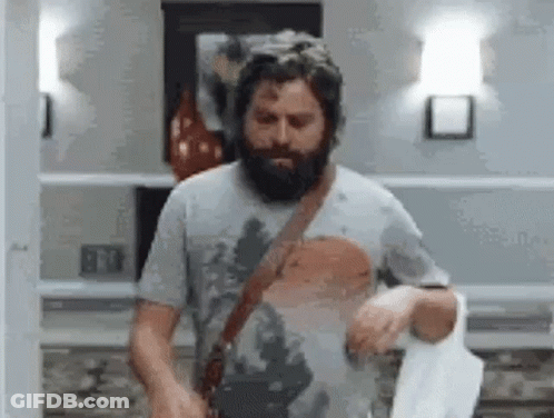 Man With Beard Holding Towel GIF