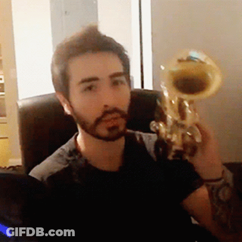 Man With Beard Holding Trumpet GIF