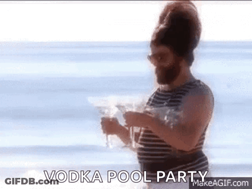 Man With Beard Holding Vodka At Pool GIF