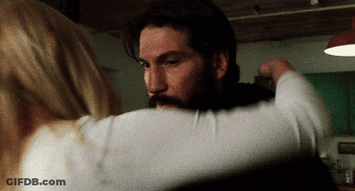 Man With Beard Hugging Blonde Woman GIF