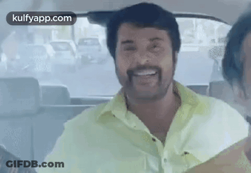 Man With Beard In Back Seat Of Car GIF