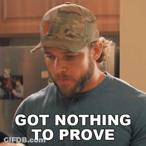 Man With Beard In Baseball Cap Says Got Nothing To Prove GIF