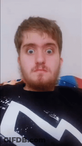 Man With Beard In Black And White Shirt With Letter L GIF