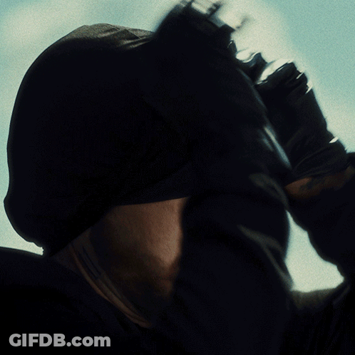 Man With Beard In Black Hat And Earring GIF
