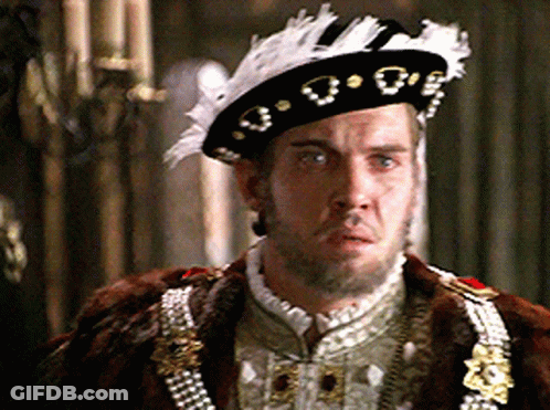 Man With Beard In Black Hat With Gold Letters GIF