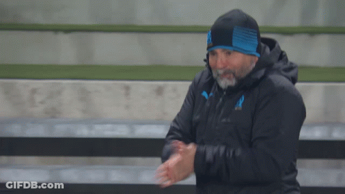 Man With Beard In Black Jacket And Blue Hat GIF