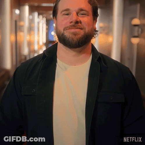 Man With Beard In Black Jacket And White Shirt GIF