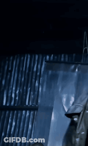 Man With Beard In Black Jacket Saying Moonshine GIF