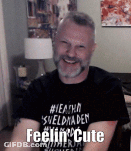 Man With Beard In Black Shirt Saying Feelin Cute GIF