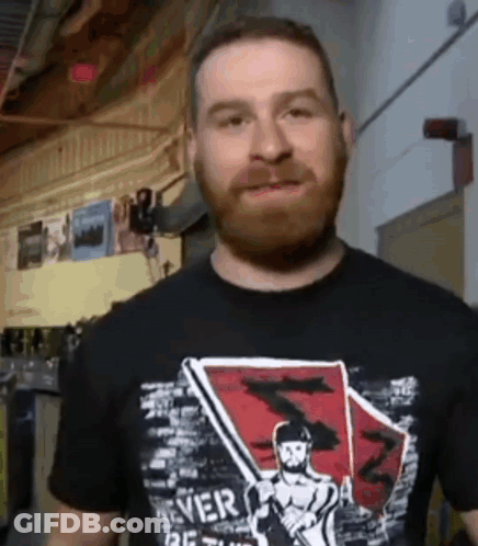 Man With Beard In Black Shirt Saying Never Be Stuck GIF