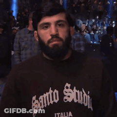 Man With Beard In Black Shirt Saying Santo Studio GIF