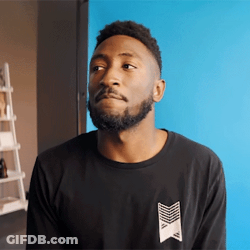 Man With Beard In Black Shirt With Arrow GIF