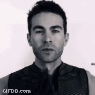 Man With Beard In Black Tank Top And Tie GIF