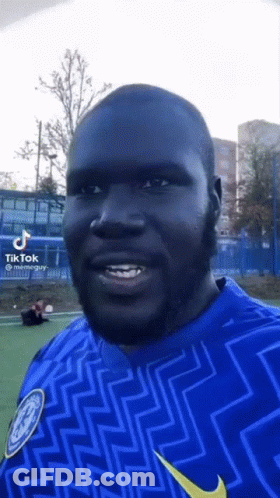 Man With Beard In Blue And Yellow Nike Shirt GIF