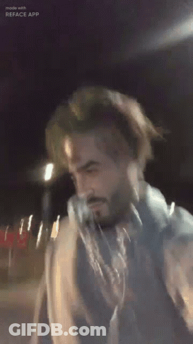 Man With Beard In Blue Jacket And Scarf GIF