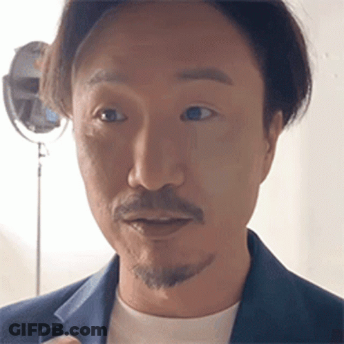 Man With Beard In Blue Jacket And White T-Shirt GIF
