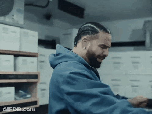 Man With Beard In Blue Jacket In Room GIF