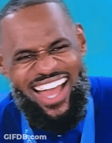 Man With Beard In Blue Shirt And Medal GIF