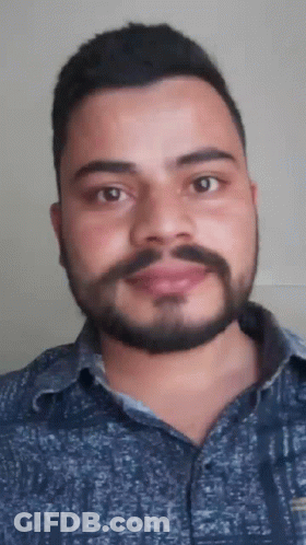 Man With Beard In Blue Shirt GIF