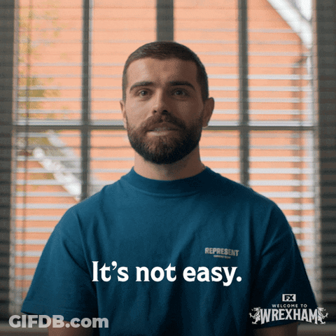 Man With Beard In Blue Shirt Says Its Not Easy GIF