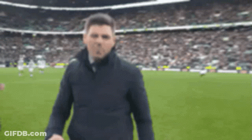 Man With Beard In Blue Soccer Jersey Blowing Kiss GIF
