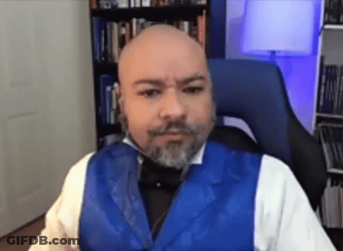 Man With Beard In Blue Vest And Bow Tie GIF