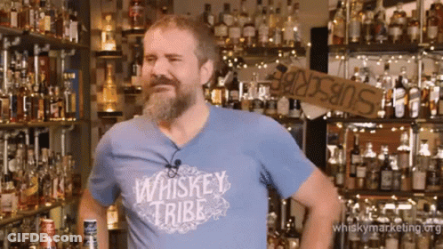 Man With Beard In Blue Whiskey Tribe Shirt GIF