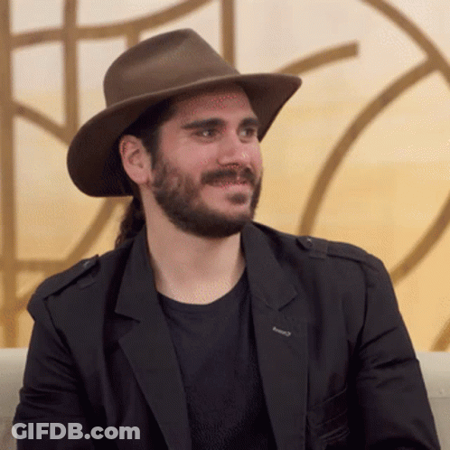 Man With Beard In Brown Hat And Black Jacket GIF