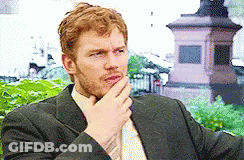 Man With Beard In Brown Vest GIF