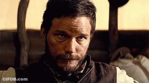 Man With Beard In Brown Vest GIF