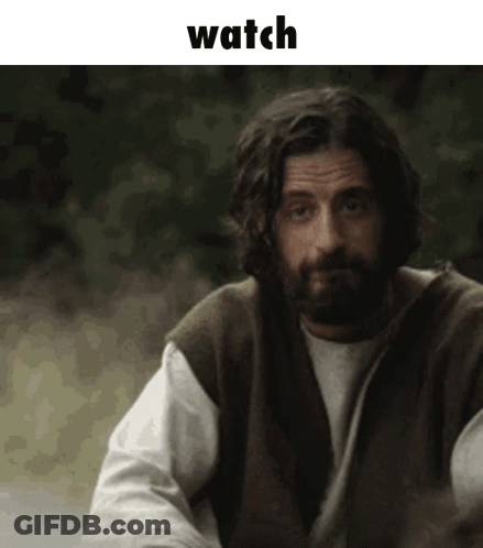 Man With Beard In Brown Vest And White Shirt With Watch GIF