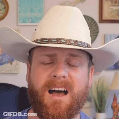 Man With Beard In Cowboy Hat Eyes Closed GIF