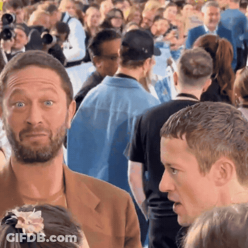 Man With Beard In Crowd GIF