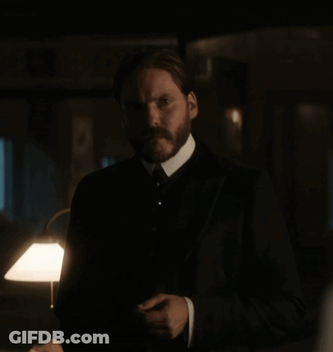 Man With Beard In Dark Room GIF