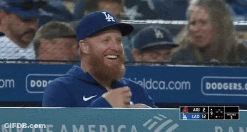 Man With Beard In Dodgers Hat Smiles GIF