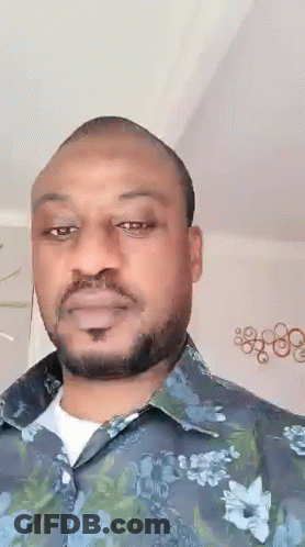 Man With Beard In Floral Shirt GIF