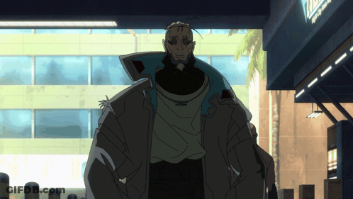 Man With Beard In Front Of Apollo Building GIF
