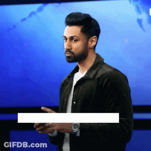 Man With Beard In Front Of Blue Screen GIF