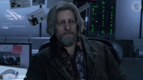 Man With Beard In Front Of Defense Screen GIF