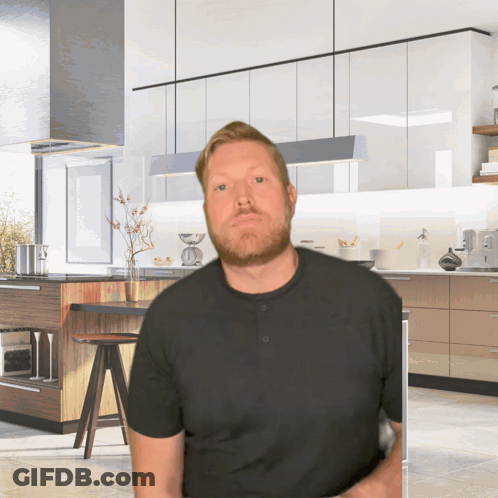 Man With Beard In Front Of Kitchen GIF